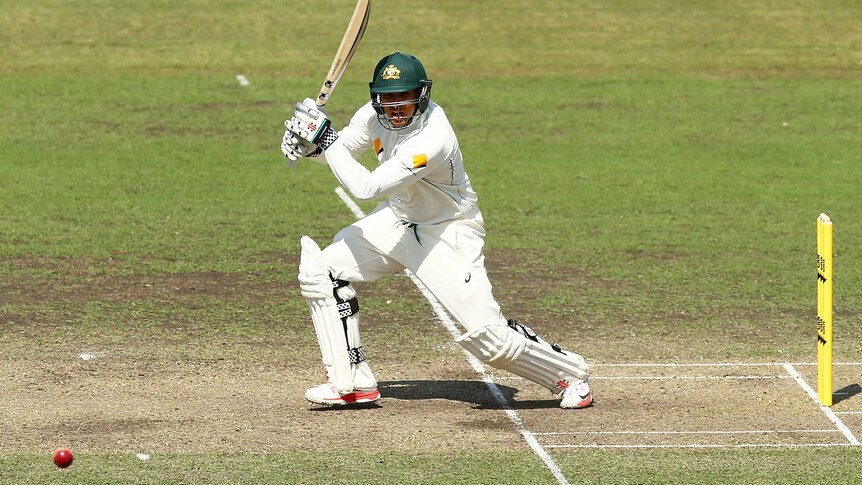 Usman Khawaja plays a shot for the CA XI against New Zealand