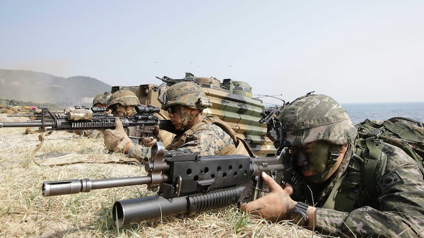 US and South Korean marines aim their weapons during an amphibious landing exercise in South Korea.
