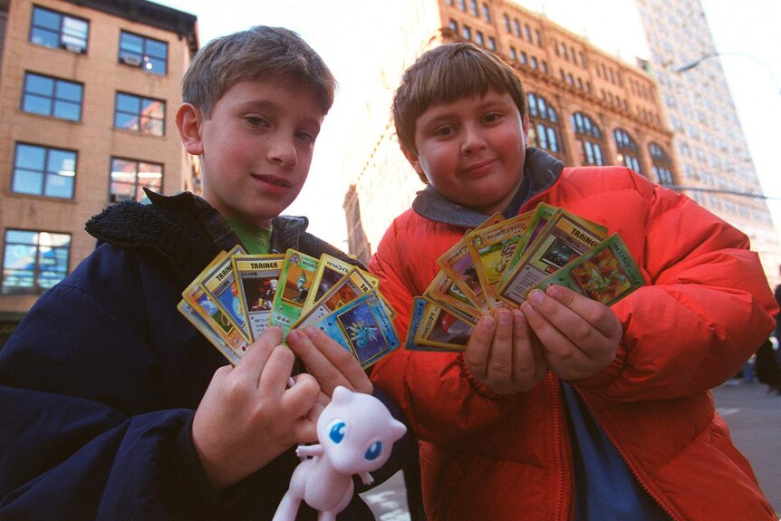Kids in New York City line up to buy Pokemon merchandise.