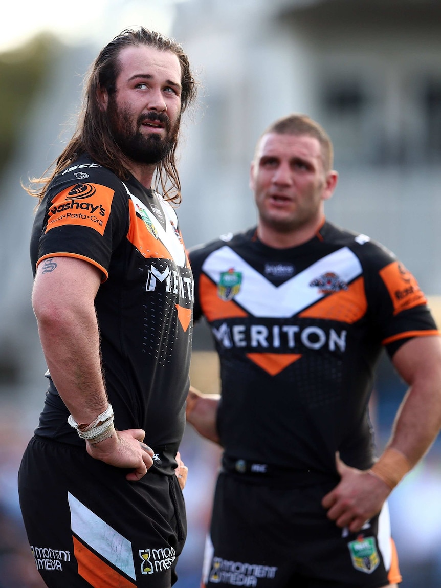 Aaron Woods and Robbie Farah of the Tigers