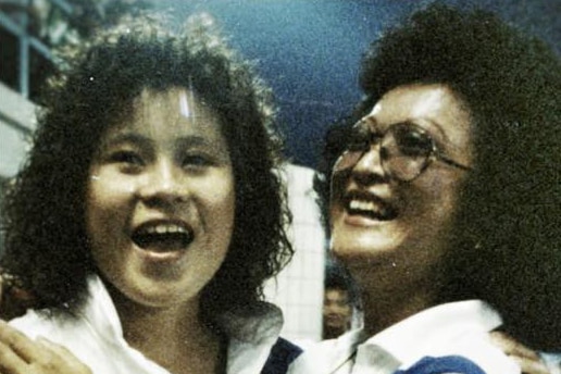 Smiling mother and daughter in a pic from the 1980s.
