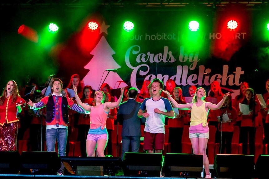 Singers at Carols By Candlelight in Hobart.
