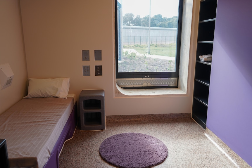 A single bed in a room at the new youth training centre