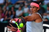 Rafael Nadal hits a forehand return to Leonardo Mayer in the second round of the Australian Open.