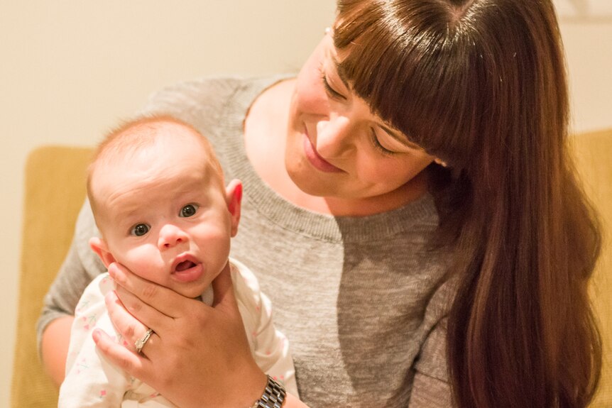 Jess Harden with her baby who suffered from a food allergy