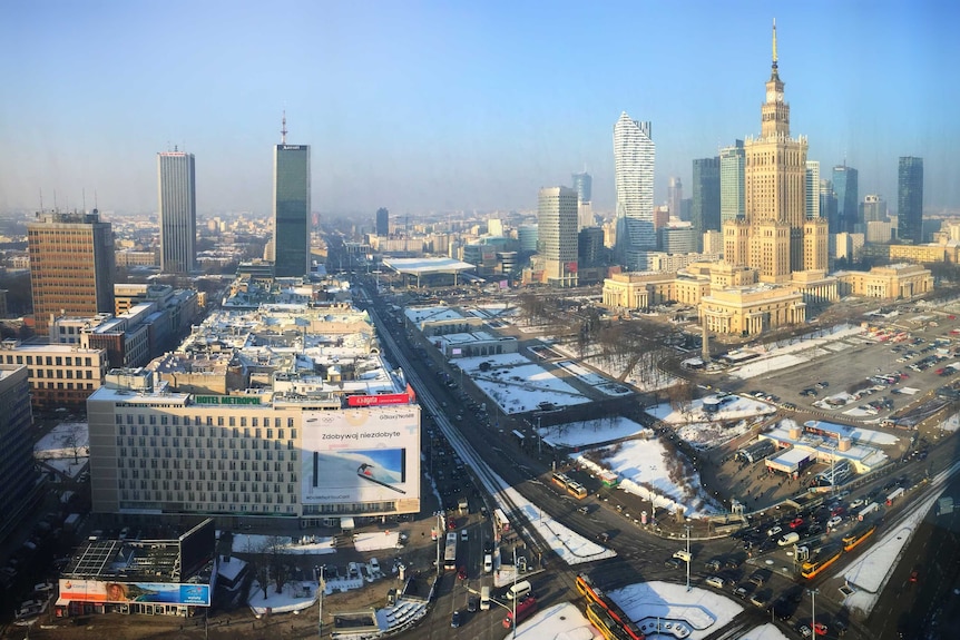 Aerial view of the skyline of Warsaw, Poland, on a clear and sunny day.