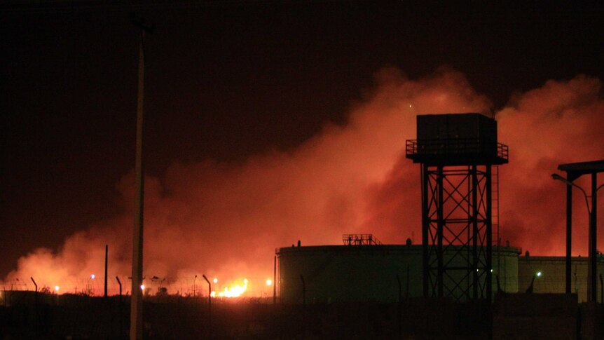Fire engulfs the Yarmouk ammunition factory in Sudan's capital Khartoum after an explosion in which two people died.