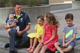 Hussey with family
