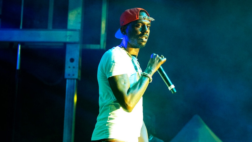 Young Dolph performs on stage.
