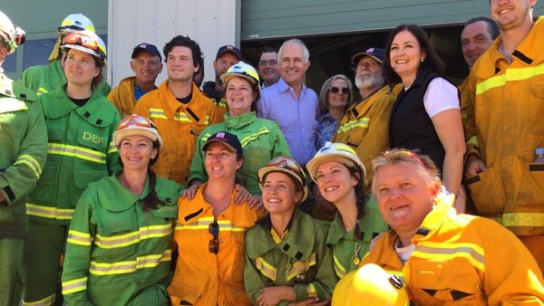 PM poses with DELWP, CFA staff at Wye River