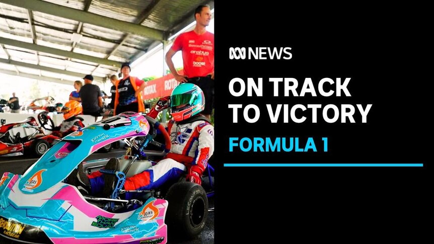 On Track to Victory, Formula 1: Girl sitting in go-cart wearing a helmet and racing suit 
