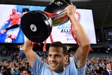 Bobo of Sydney holds up the FFA Cup trophy
