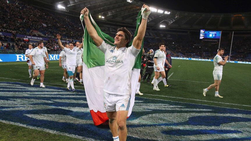Upset victory ... Giovanbattista Venditti celebrates with his Italian team-mates