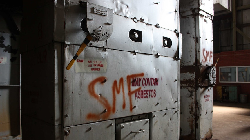 An asbestos warning spray-painted on metal at the Morwell Power Station