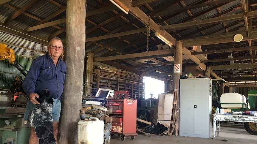 Ted Bussey inside his farm shed.