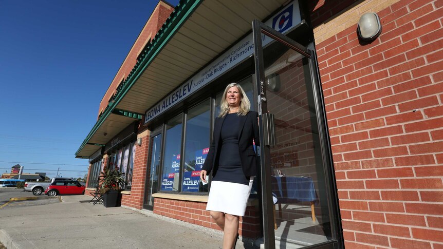 Leona Alleslev walking out of her campaign office