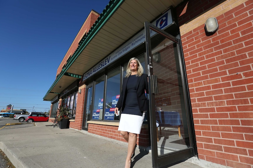 Leona Alleslev walking out of her campaign office