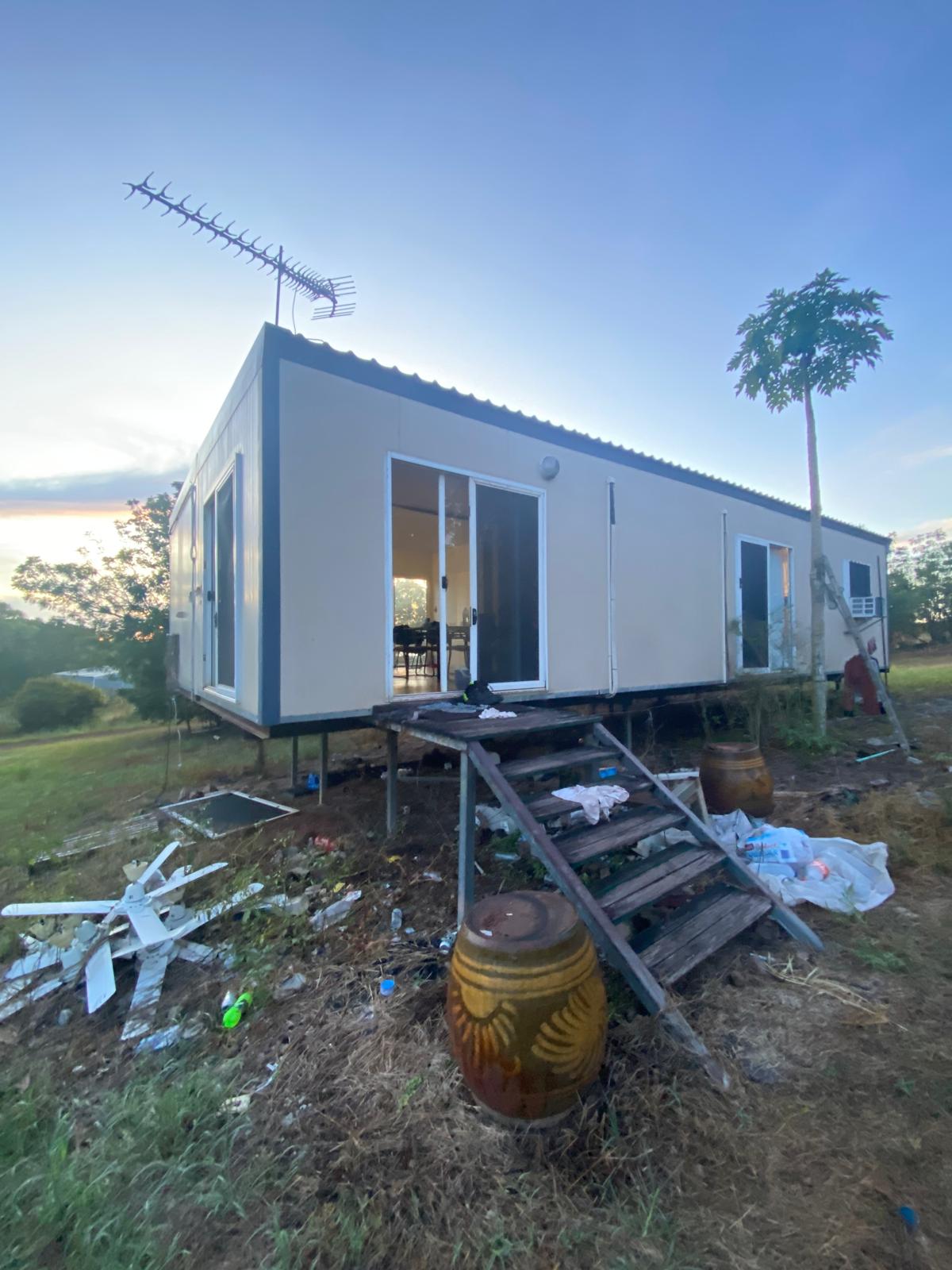 A housing container surrounded by litters.