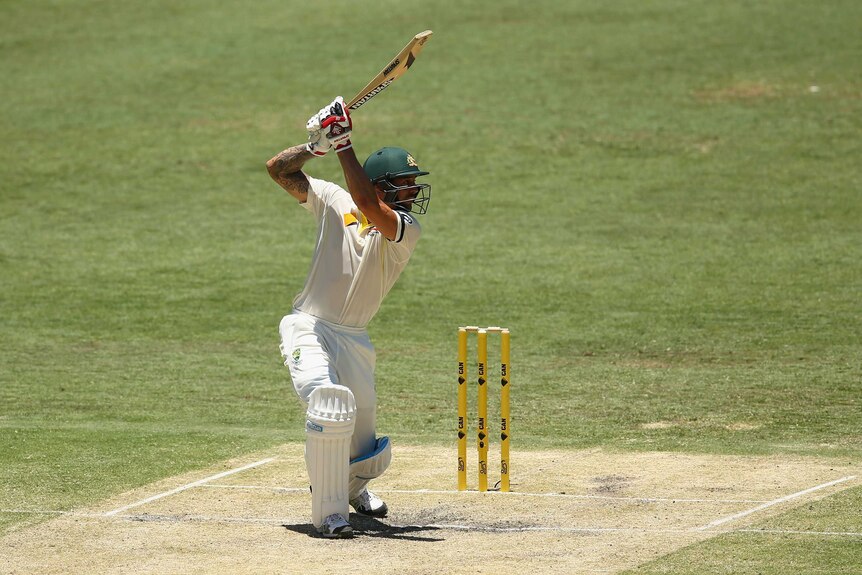 Johnson plays a big cover drive in Brisbane