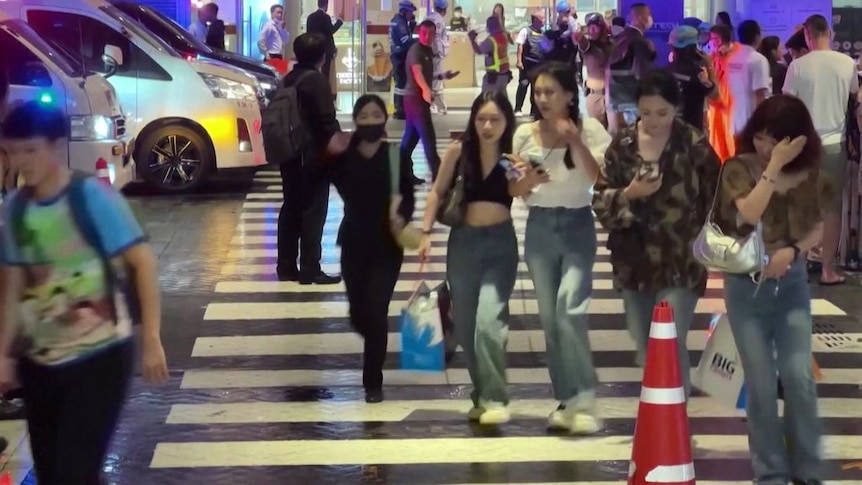 Thailand shooting: teenage suspect arrested after two killed at luxury mall
