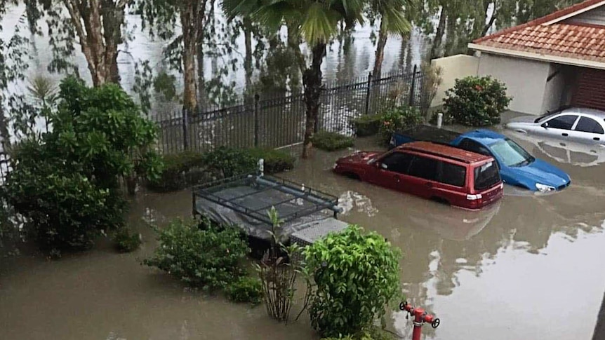 Image of flooded cars in the Townsville in February 2019.