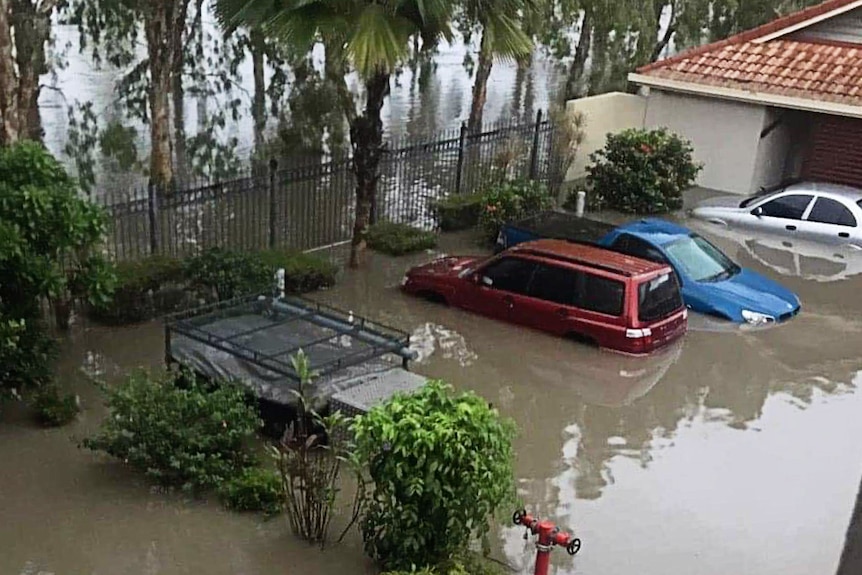 Image of flooded cars in the Townsville in February 2019.