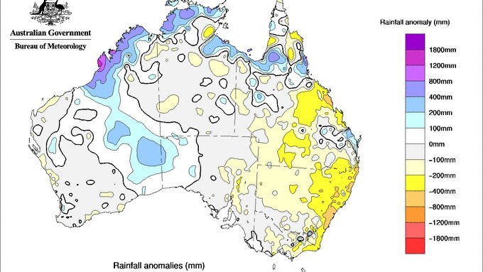 map of Australia with yellow on the east coast (dry) and blues and purples to the north and central west (wet)