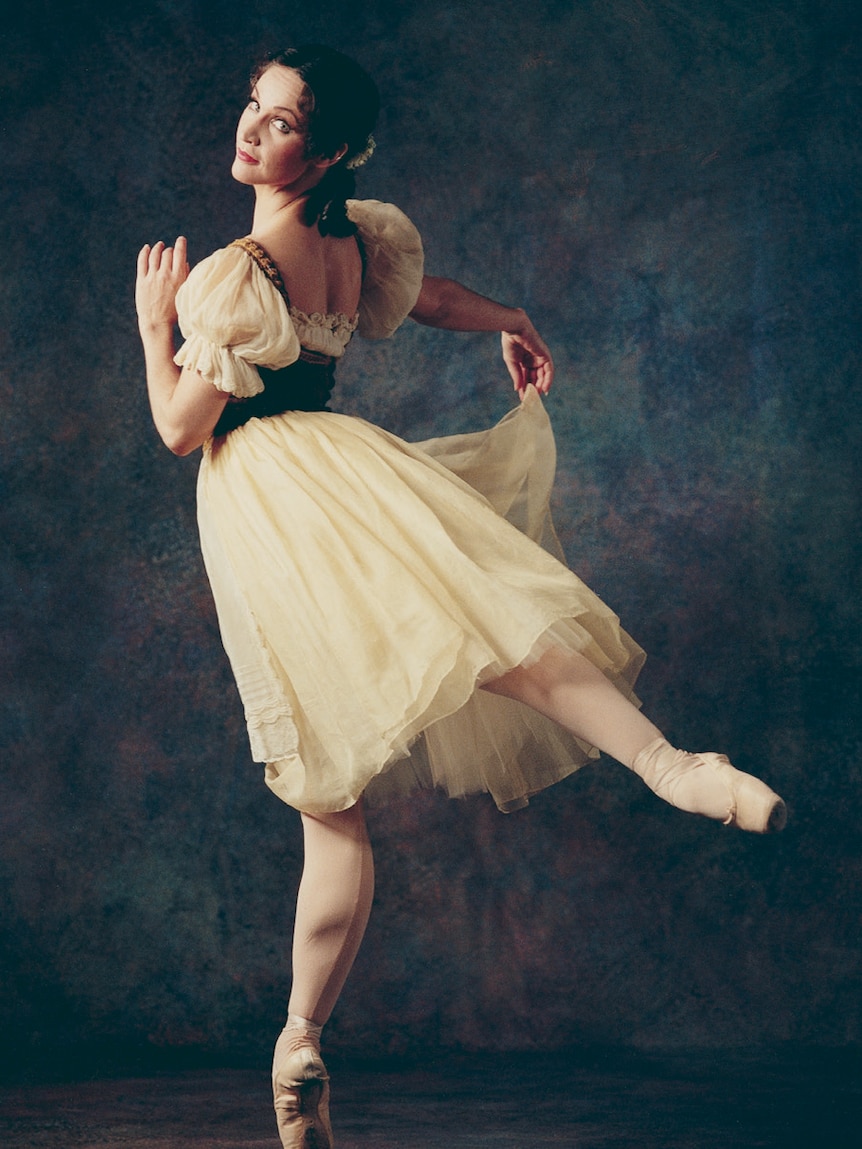 A portrait of a young ballet performer in costume