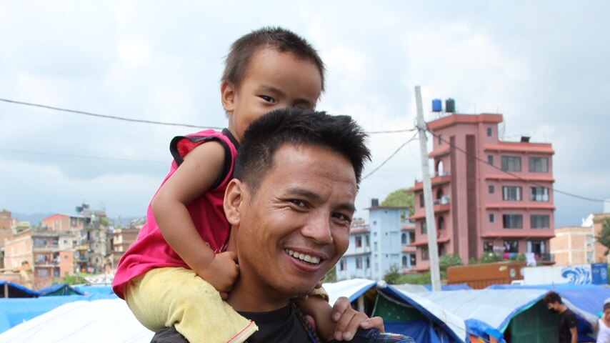 Pemba Lama and his two children wander around the camp by day