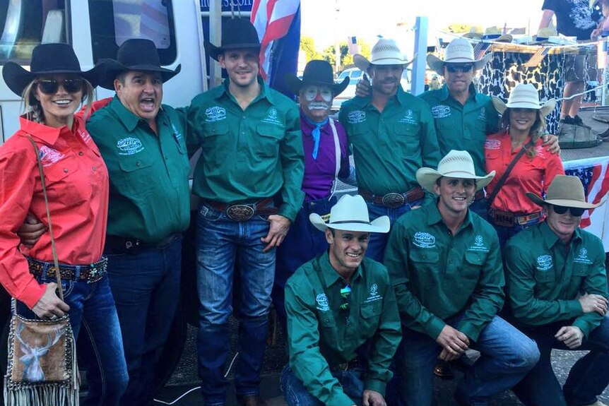 Team of men and women in rodeo gear