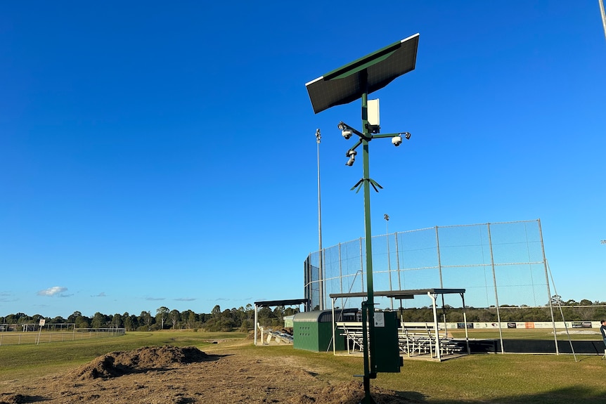 Mobile CCTV cameras overlook the sporting field.