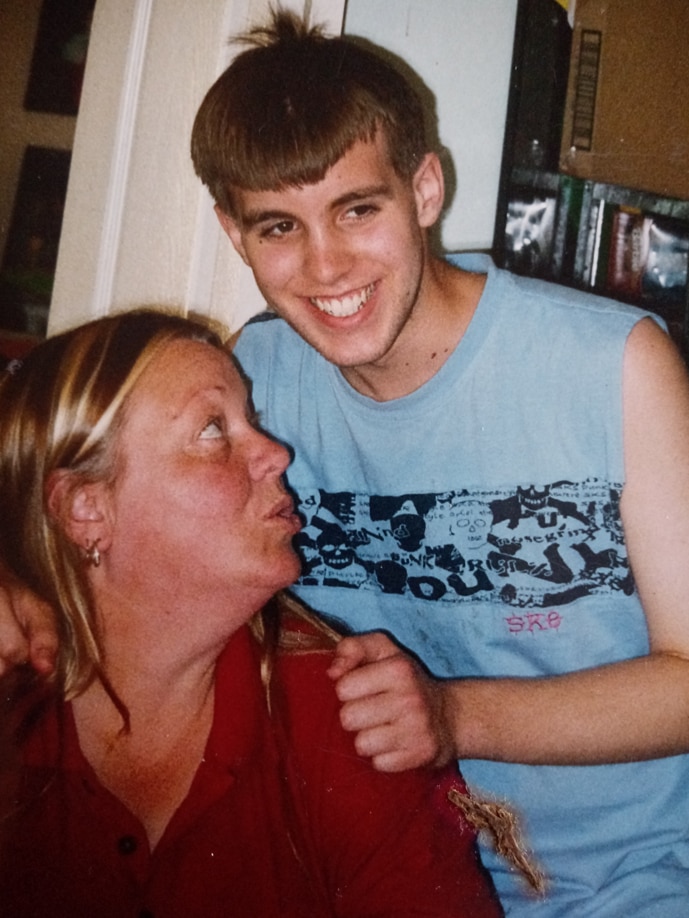 Old photo of a mum with her teenage son.