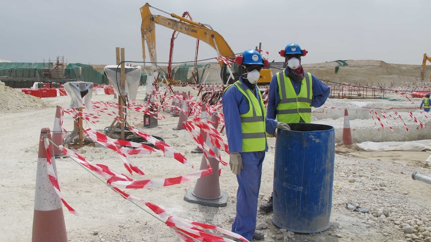 Workers at the Al-Wakrah stadium