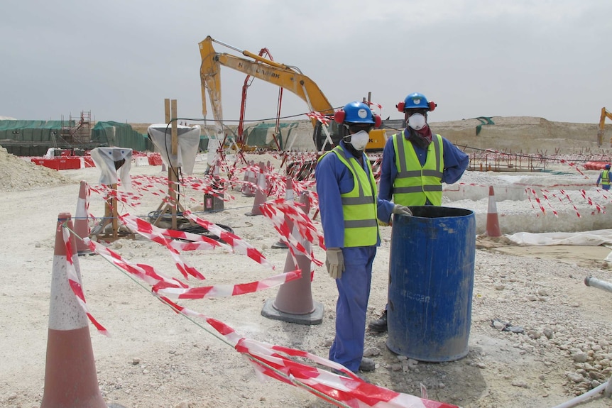 Workers at the Al-Wakrah stadium