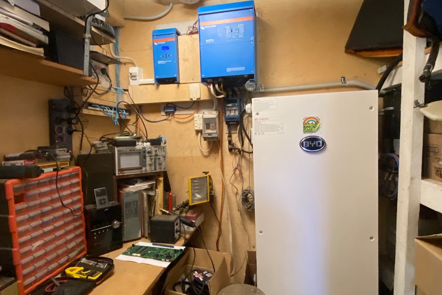 a photo of a battery and other technology in a small room 