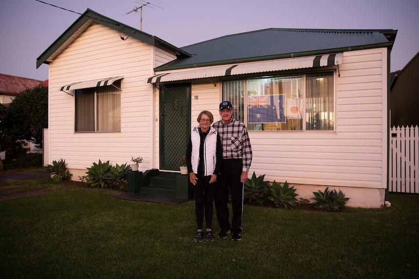 Barb and Rocker posing outside their home in NSW.