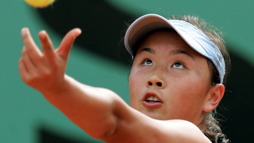 China's Shuai Peng serves during her tennis match