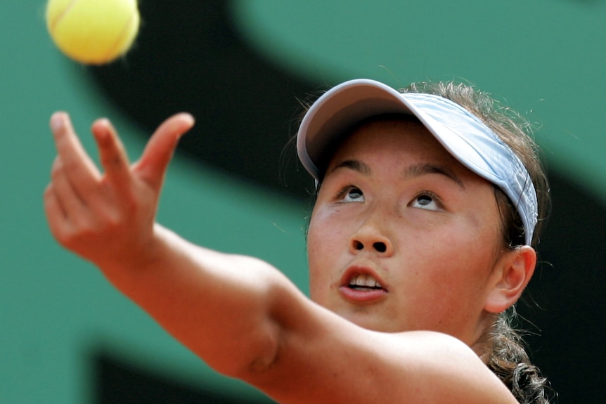 China's Shuai Peng serves during her tennis match