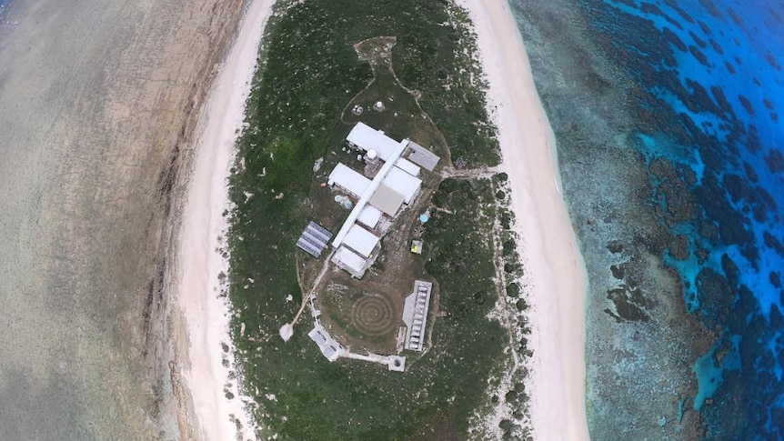 A birds eye view of a weather station on a small island