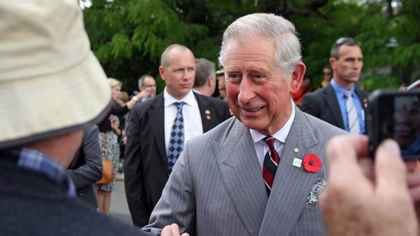 Prince Charles greets locals in the village of Richmond
