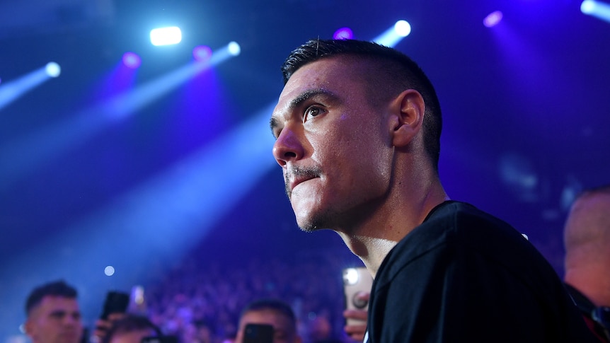 Tim Tszyu walks to the ring