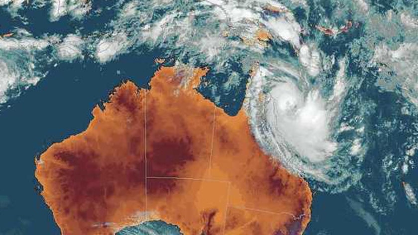 The cyclone continues to menace northern Queensland coastal districts.