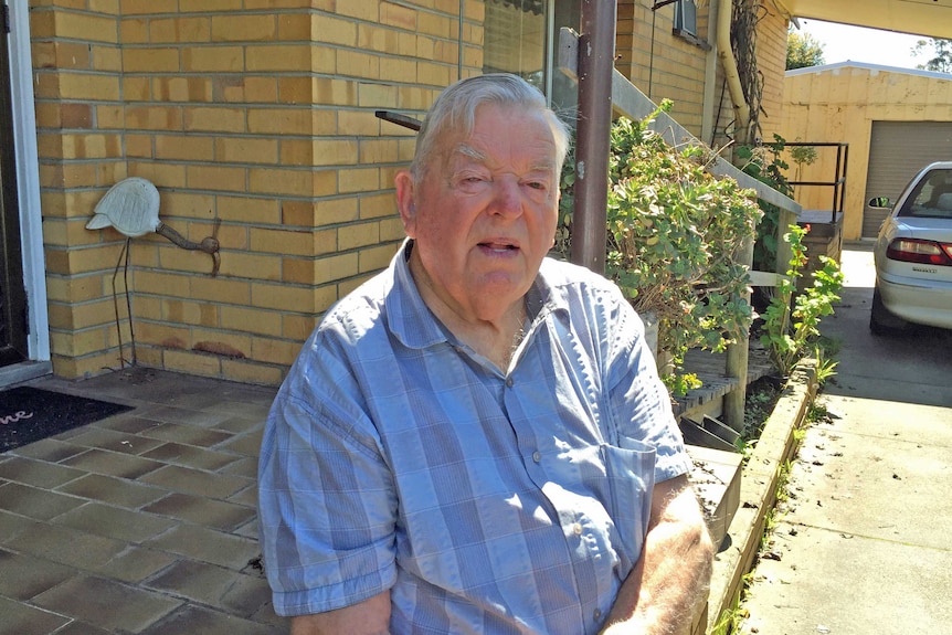 Simon Vincent sits in his driveway in Morwell