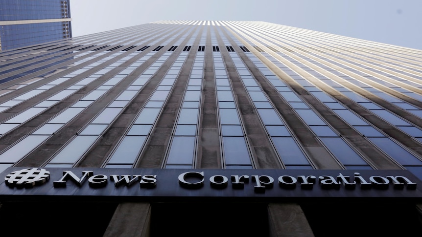 News Corp logo displayed on side of building.