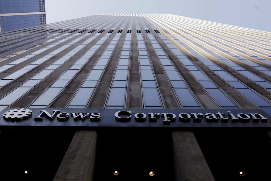 News Corp logo displayed on side of building.