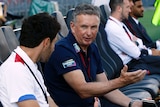 Jets coach Ernie Merrick watches the team warm up against Adelaide United on December 16, 2017.