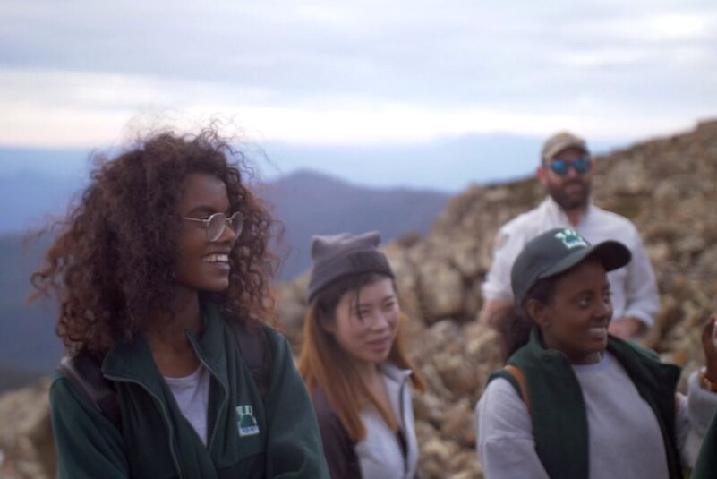 Participants in Get Outside bushwalking program stand on Hartz Mountain