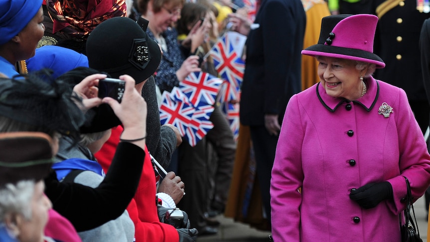 Britain's Queen Elizabeth II accompanied by the Bishop of Leicester visits Leicester Cathedral in central England