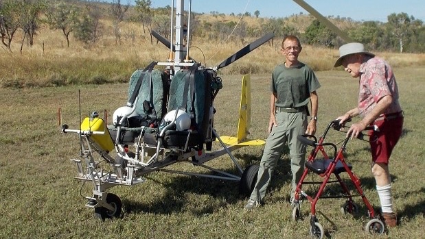 David Goodall leans on his walker as he stands next to the gyrocopter which flew him to a remote Kimberley station.