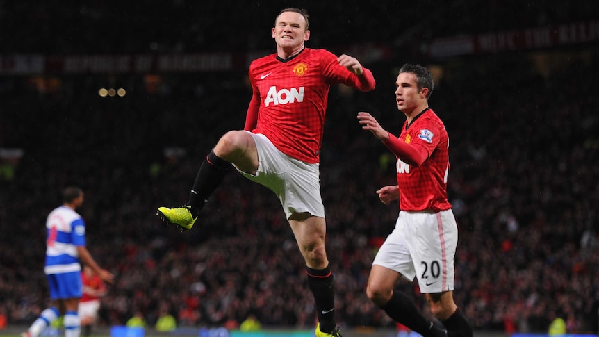 Wayne Rooney celebrates the winner at Old Trafford
